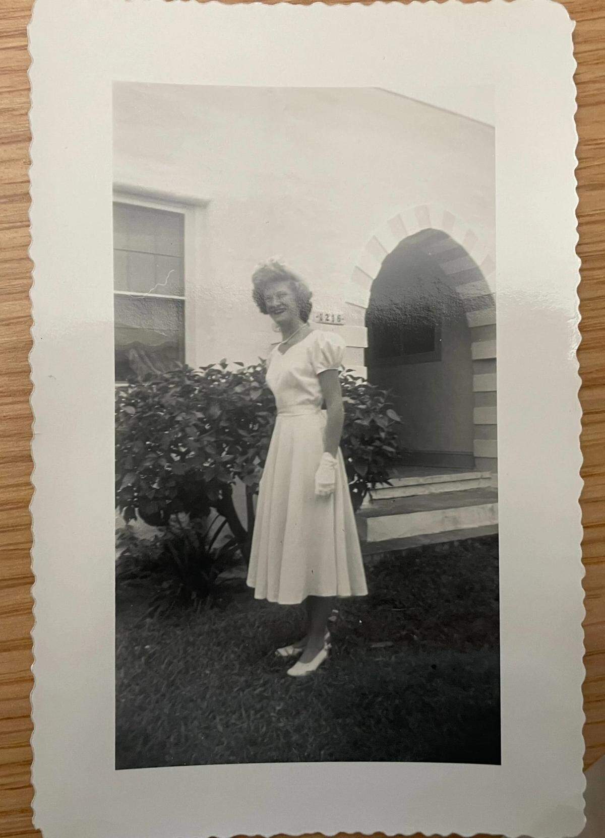 Longtime Opa-locka resident Diane Ricke stands outside her home on Sesame Street.